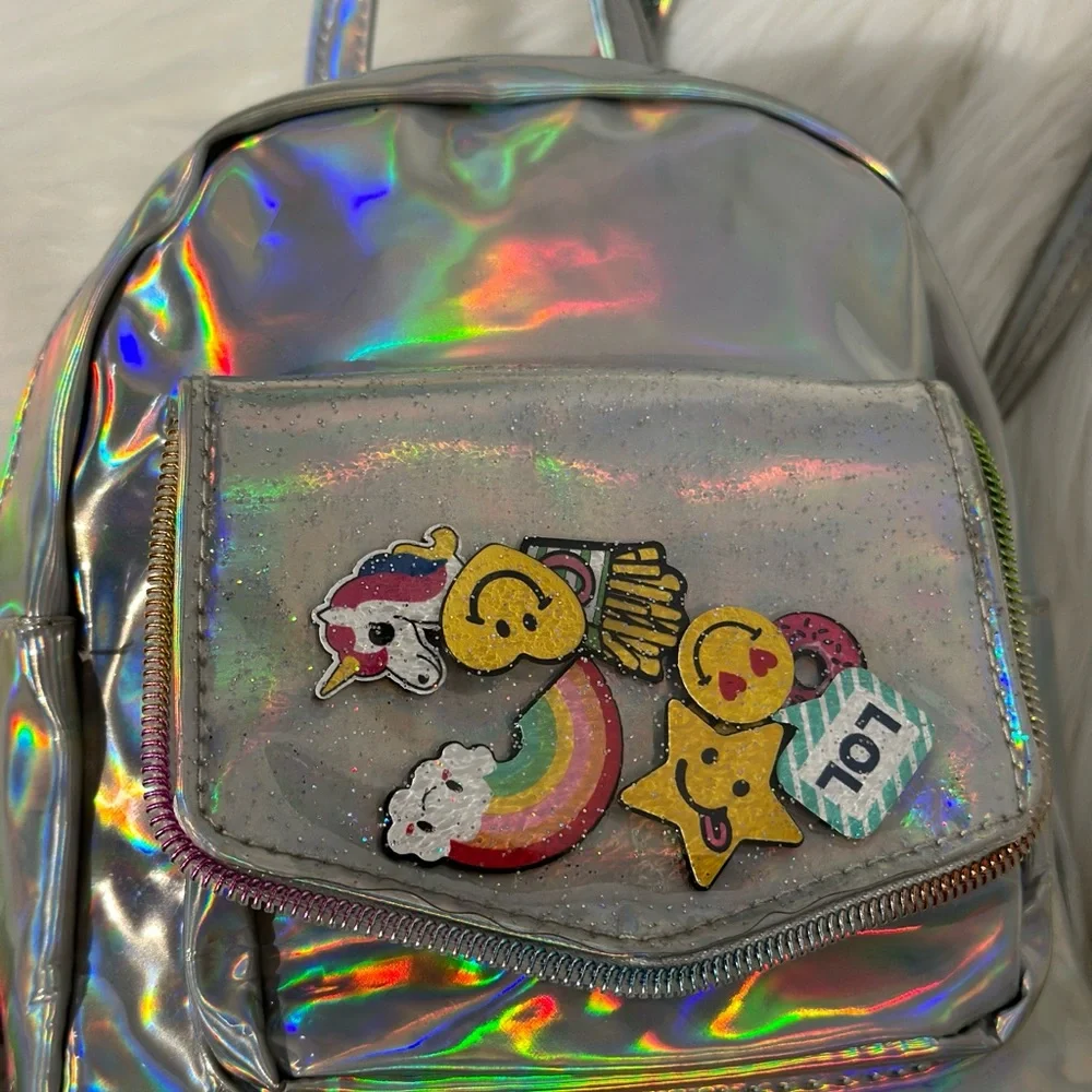 Place Silver Reflective Backpack with Adjustable Straps